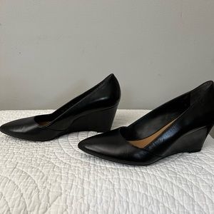 Franco Sarto black leather wedge pumps